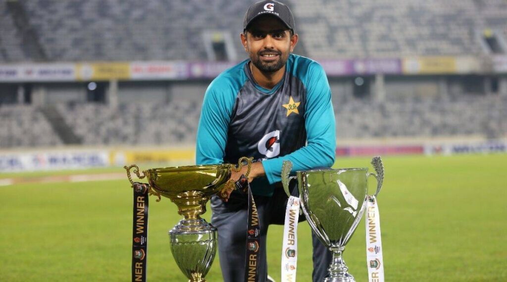 Babar with ICC Winning trophies